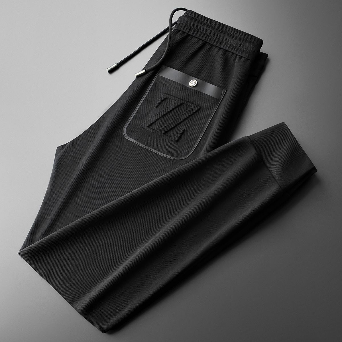 Sporty jogpants med broderi