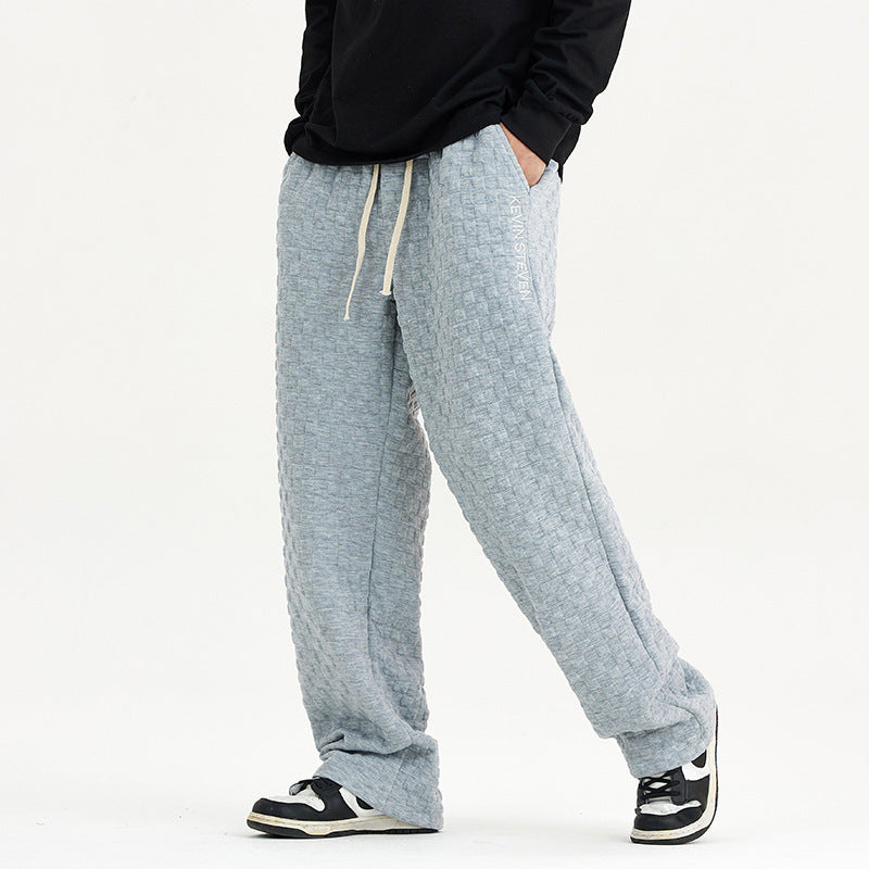 Løstsiddende ternede strikbukser