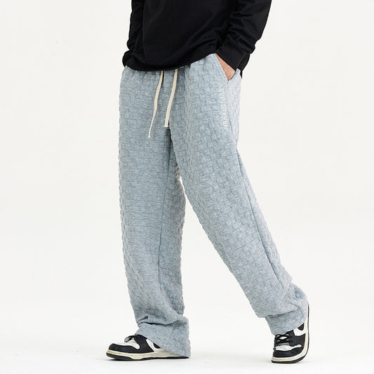 Løstsiddende ternede strikbukser